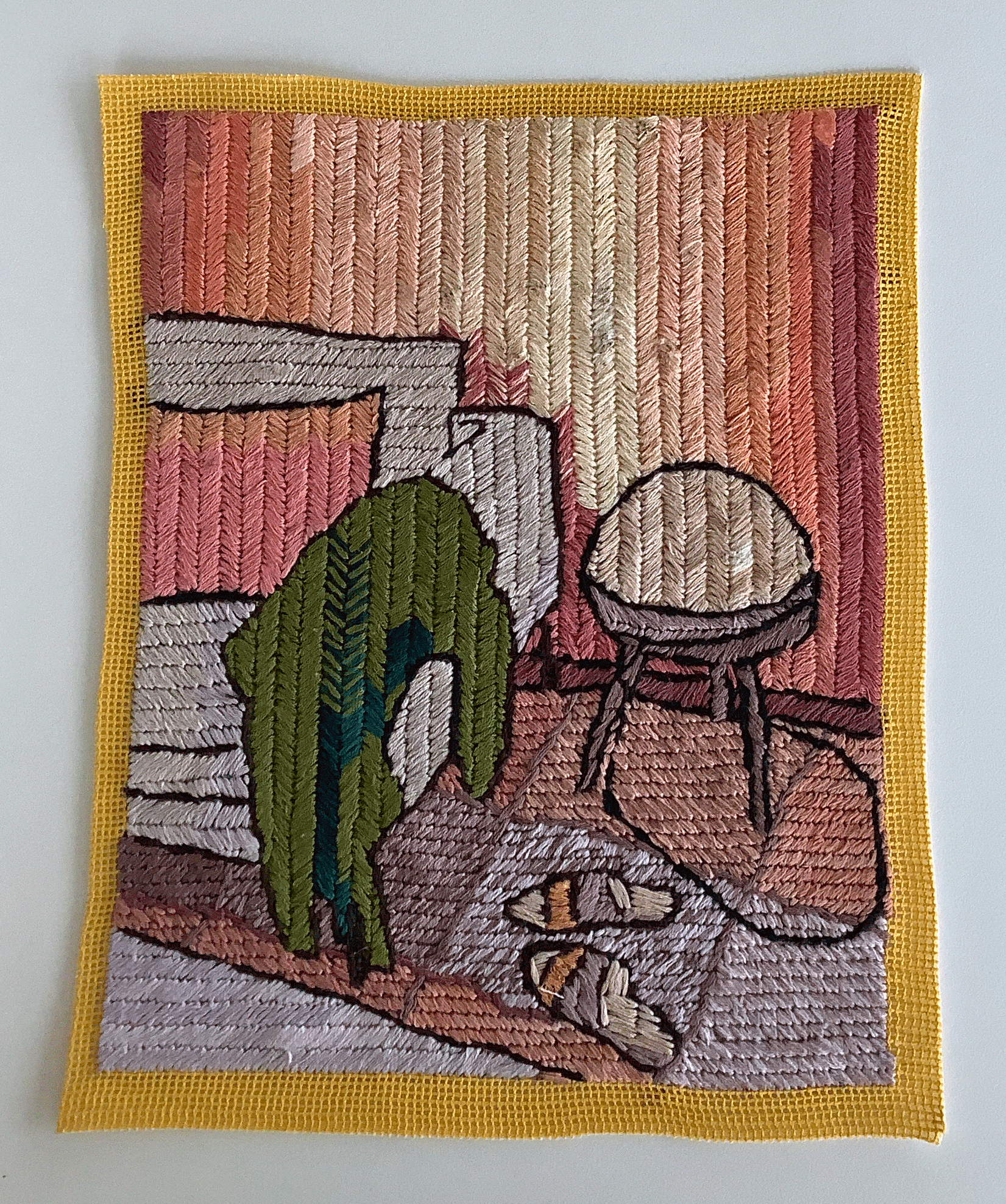 Needlepoint on cotton canvas.